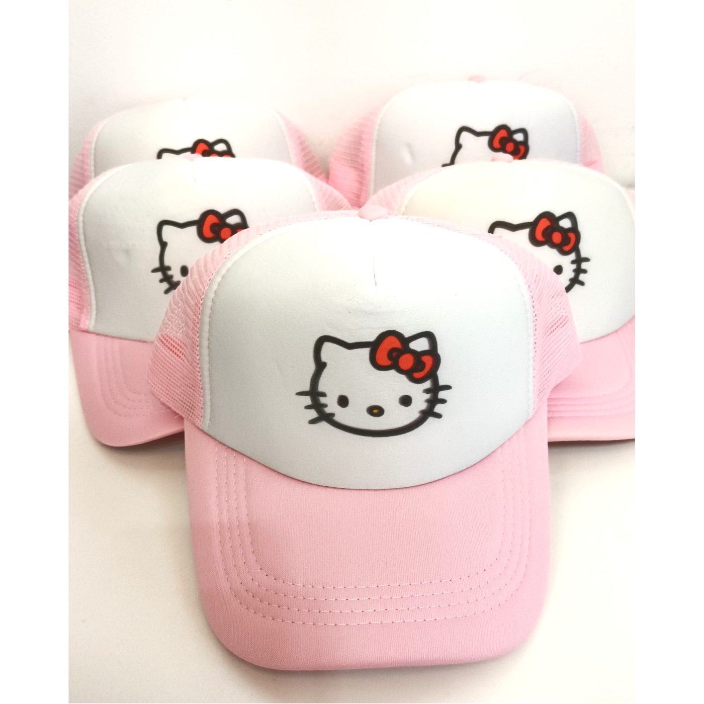 Gorras trucker rosas y blancas personalizadas, apiladas